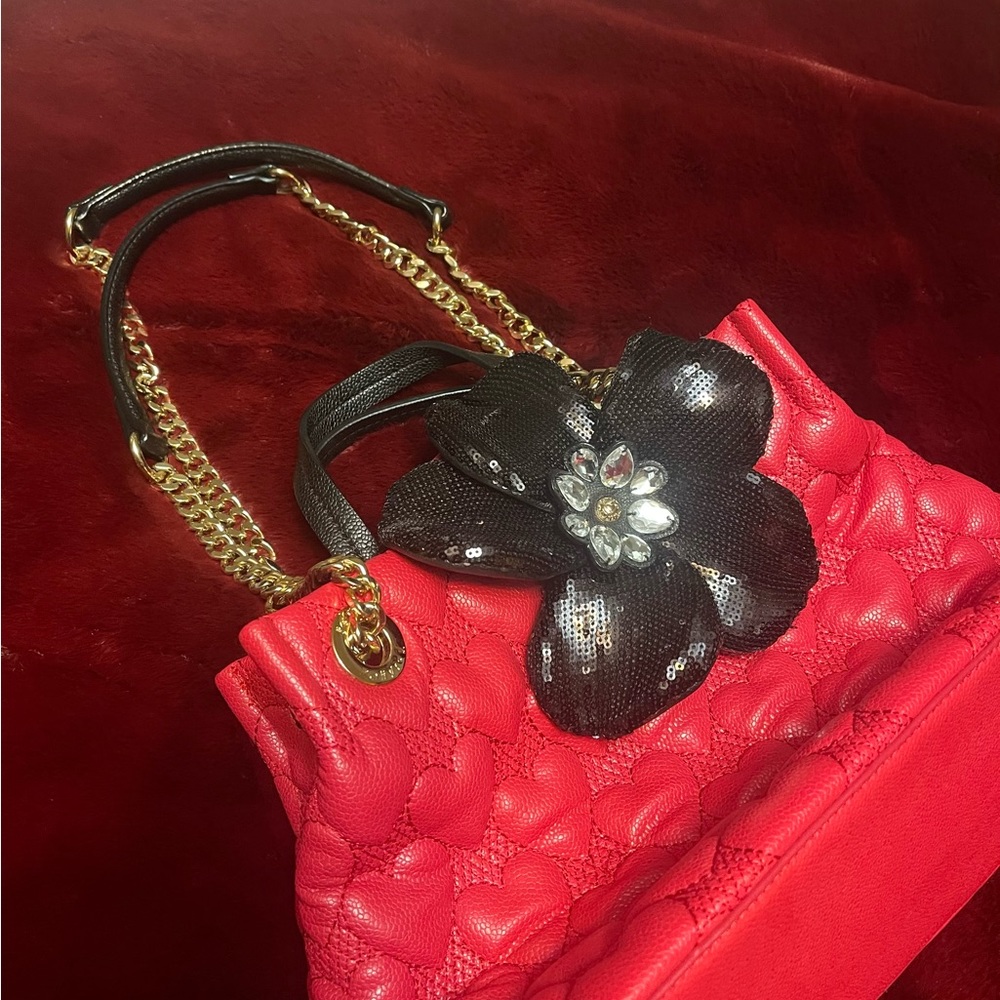 Betsy Johnson Crossbody/ Chain/Strap handbag.